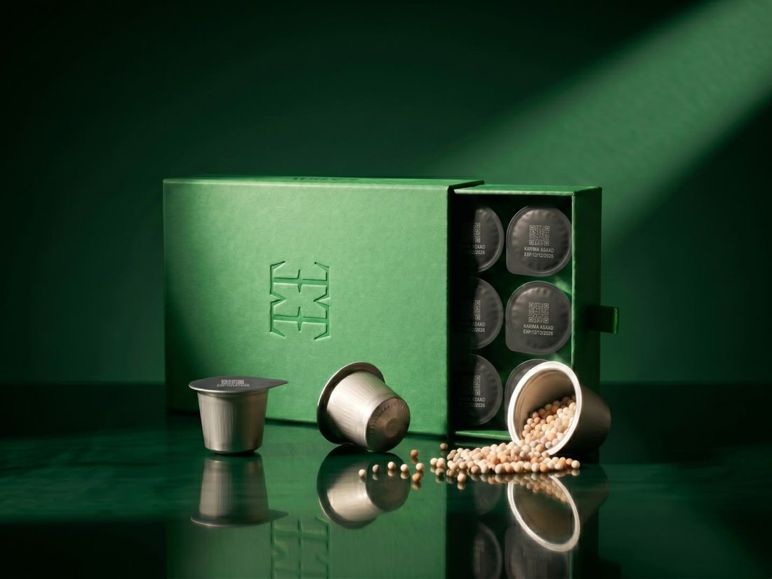 TMRW personalised supplement pods in signature green boxes